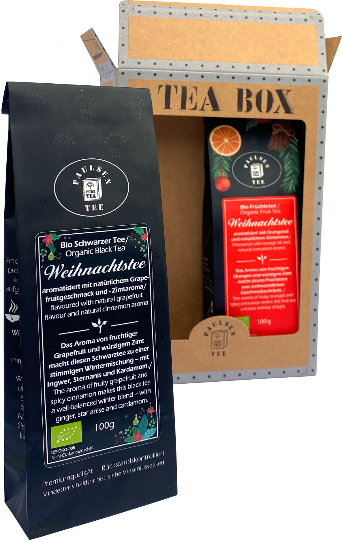 Schwarzer Tee und Früchtetee in einer Geschenkbox. Aufdrucke: Paulsen Tee, Bio Weihnachtstee, 100g, EU-Bio-Logo. Box geöffnet.