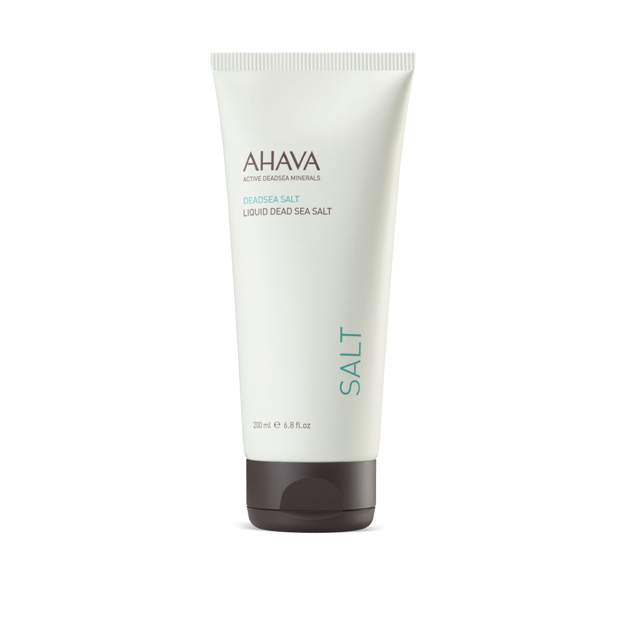 Creme-Tube mit AHAVA-Logo und Schriftzug DEADSEA SALT. Brauner Deckel, grüne Schrift auf weißem Hintergrund.