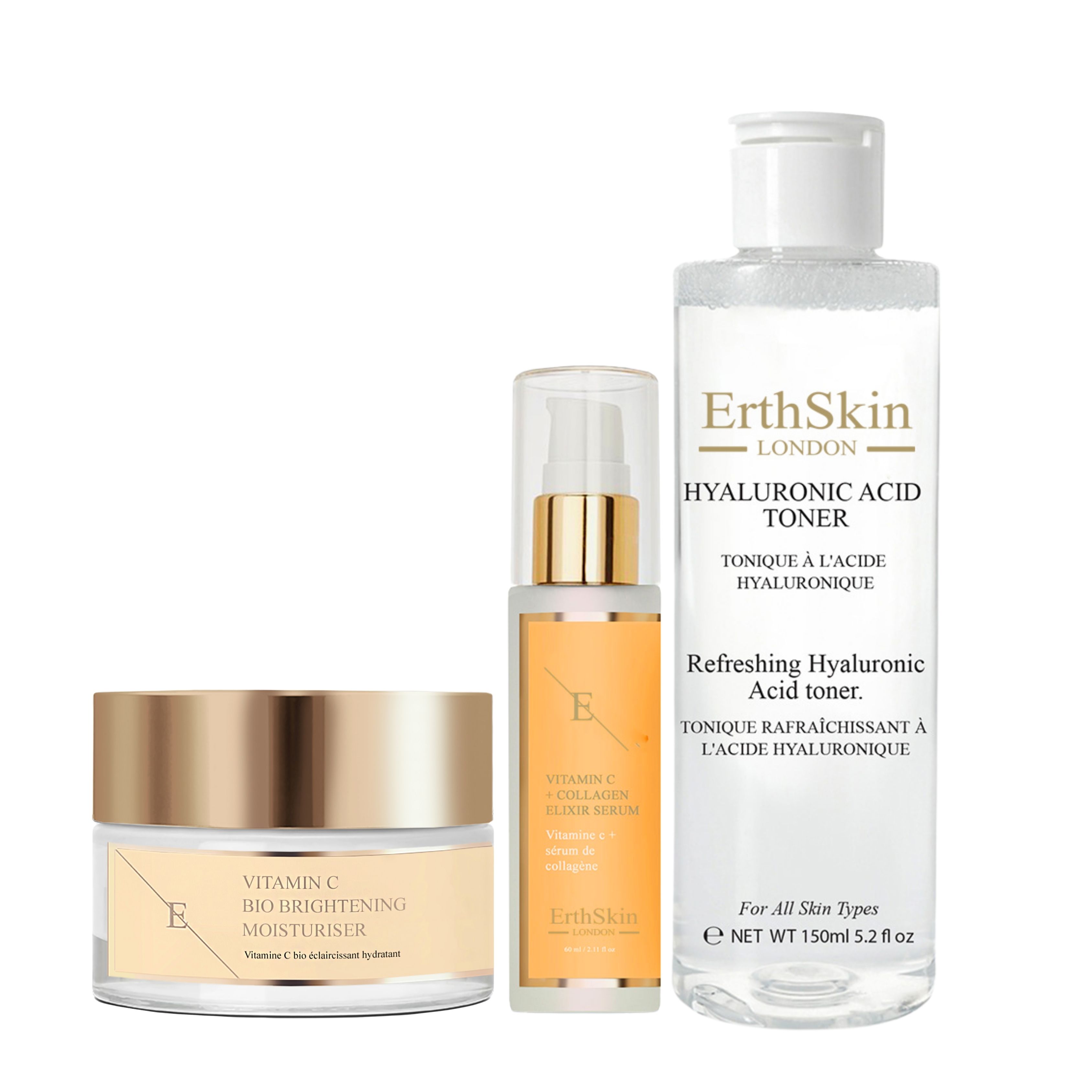Set aus Creme, Serum und Toner. Creme- und Serumbehälter mit goldfarbenen Deckeln. Tonerflasche mit weißem Deckel. Beschriftung: ErthSkin London, Vitamin C.