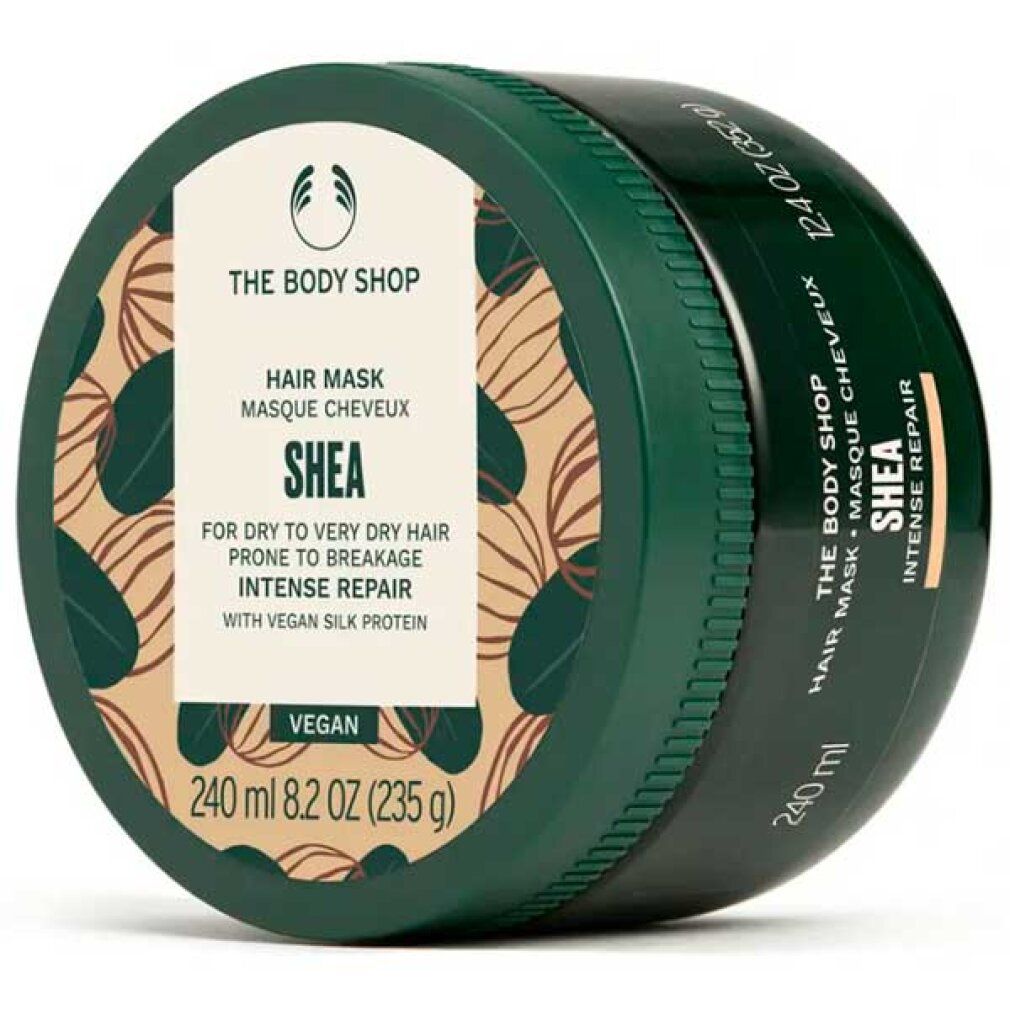 Runde, grüne Dose mit Aufschrift SHEA Hair Mask. Enthält 240 ml. Vegan. The Body Shop Logo.