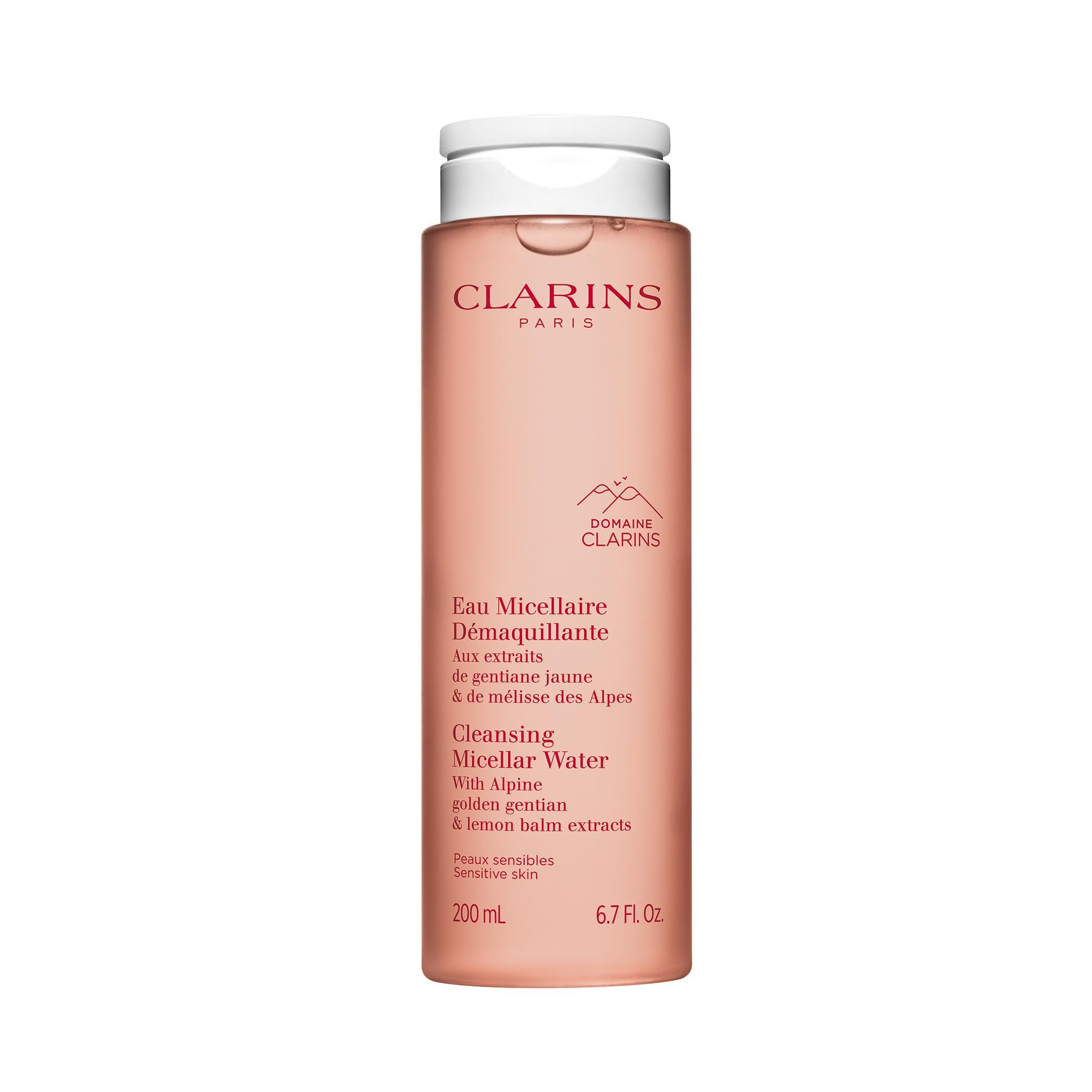 Rosa Flasche mit weißem Deckel. Text: Clarins, Eau Micellaire Démaquillante, 200ml, 6.7 FL.Oz. Für empfindliche Haut.