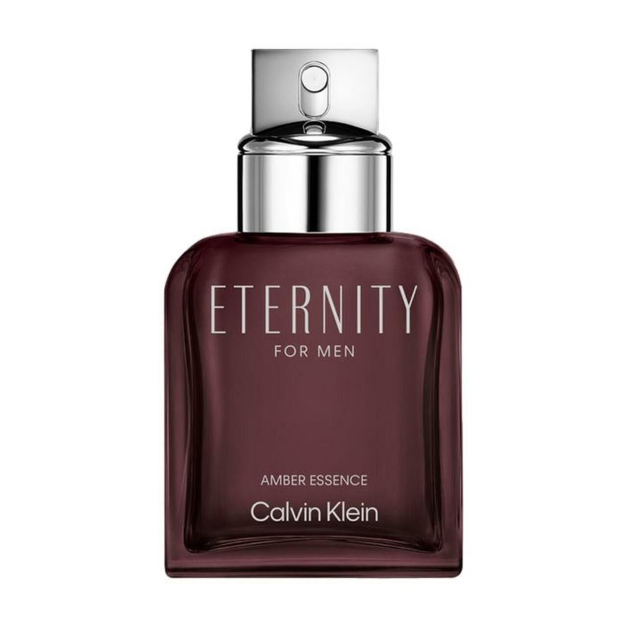 Flakon Calvin Klein Eternity for Men Amber Essence. Eckiger, brauner Glasflakon mit silbernem Verschluss. Schriftzug Eternity, Amber Essence.
