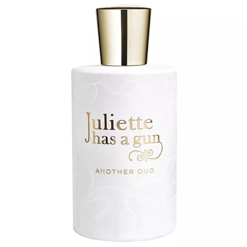 Weiße Flasche mit goldener Kappe. Goldener Schriftzug: Juliette has a gun, Another Oud. Floral Muster.