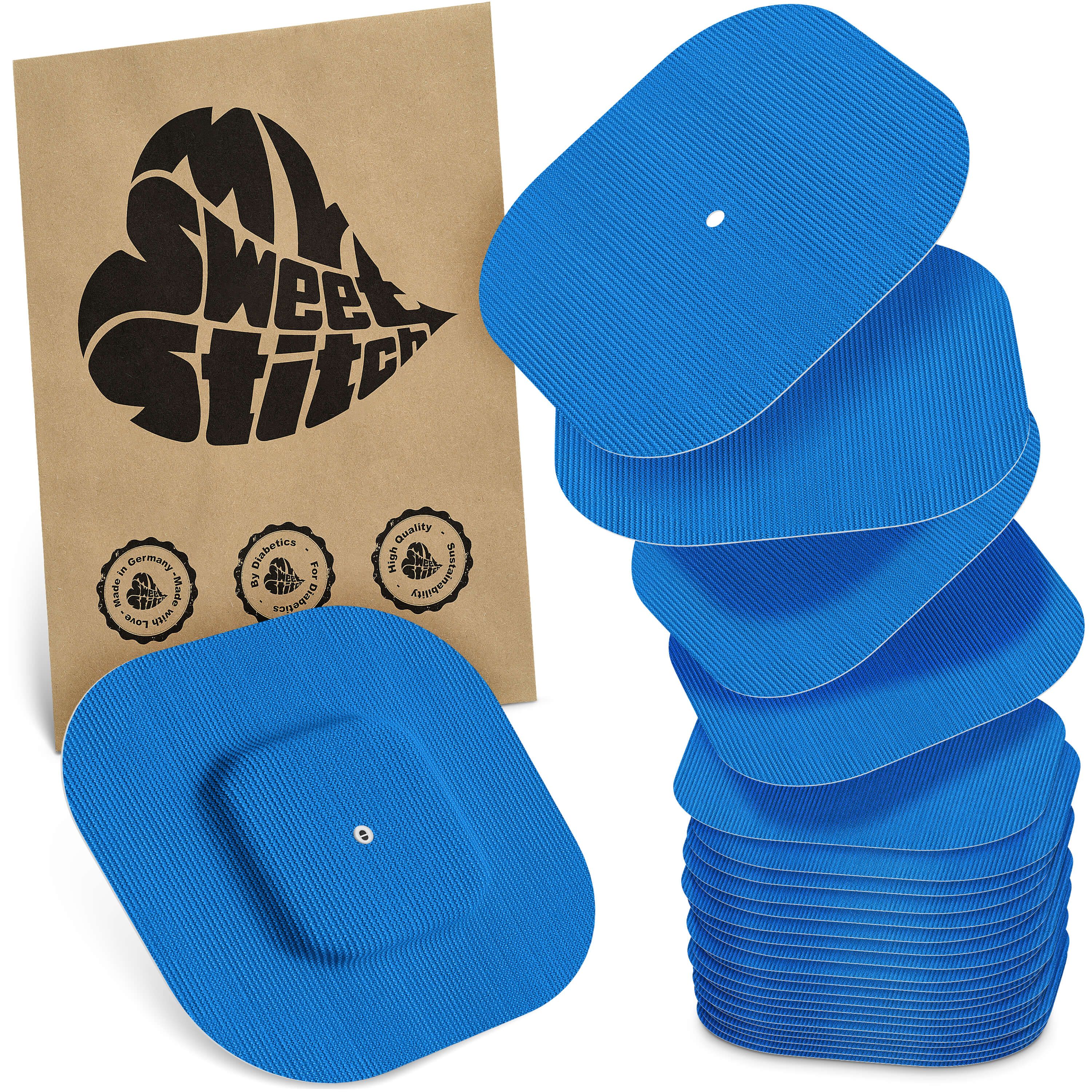Blaue, quadratische Pflaster mit einem kleineren, quadratischen Mittelteil. Verpackung mit Logo "MySweetStitch".