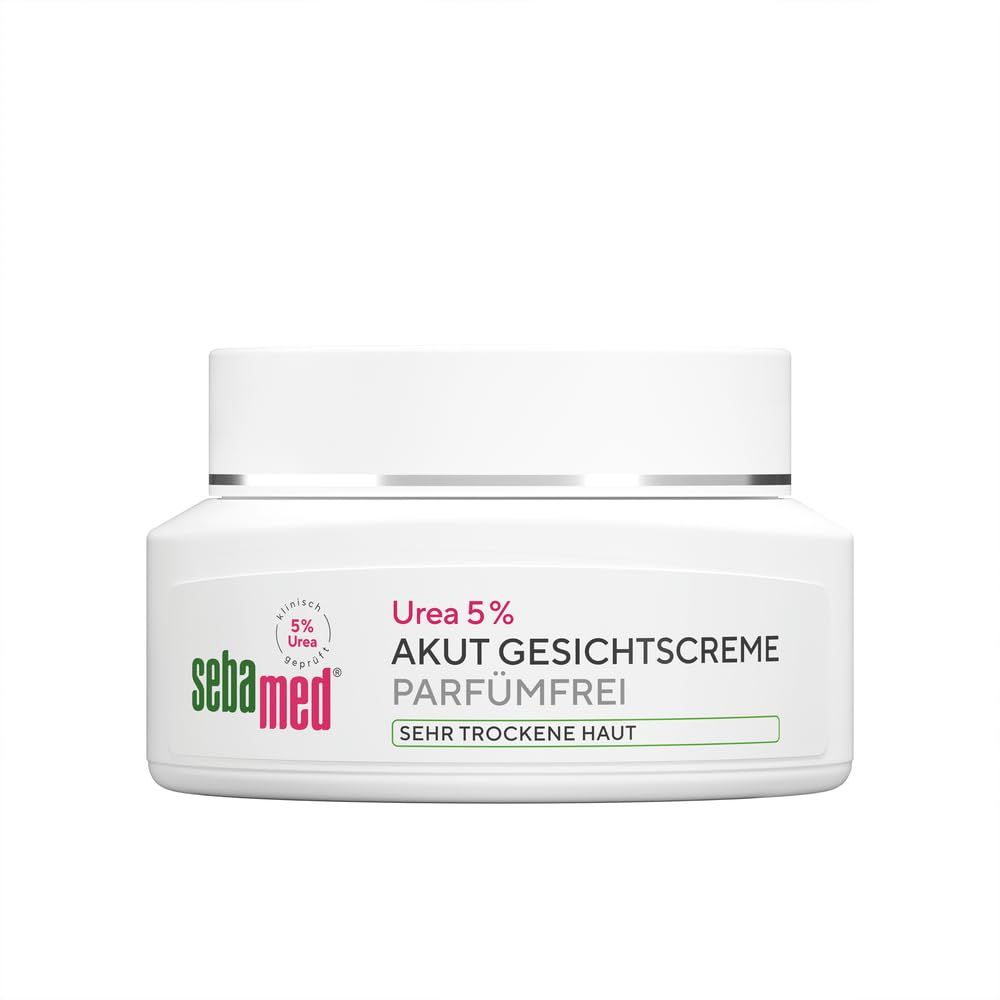 Weiße Creme-Dose mit rotem Logo und grüner Schrift. Text: Urea 5% Akut Gesichtspflege parfümfrei sehr trockene Haut.
