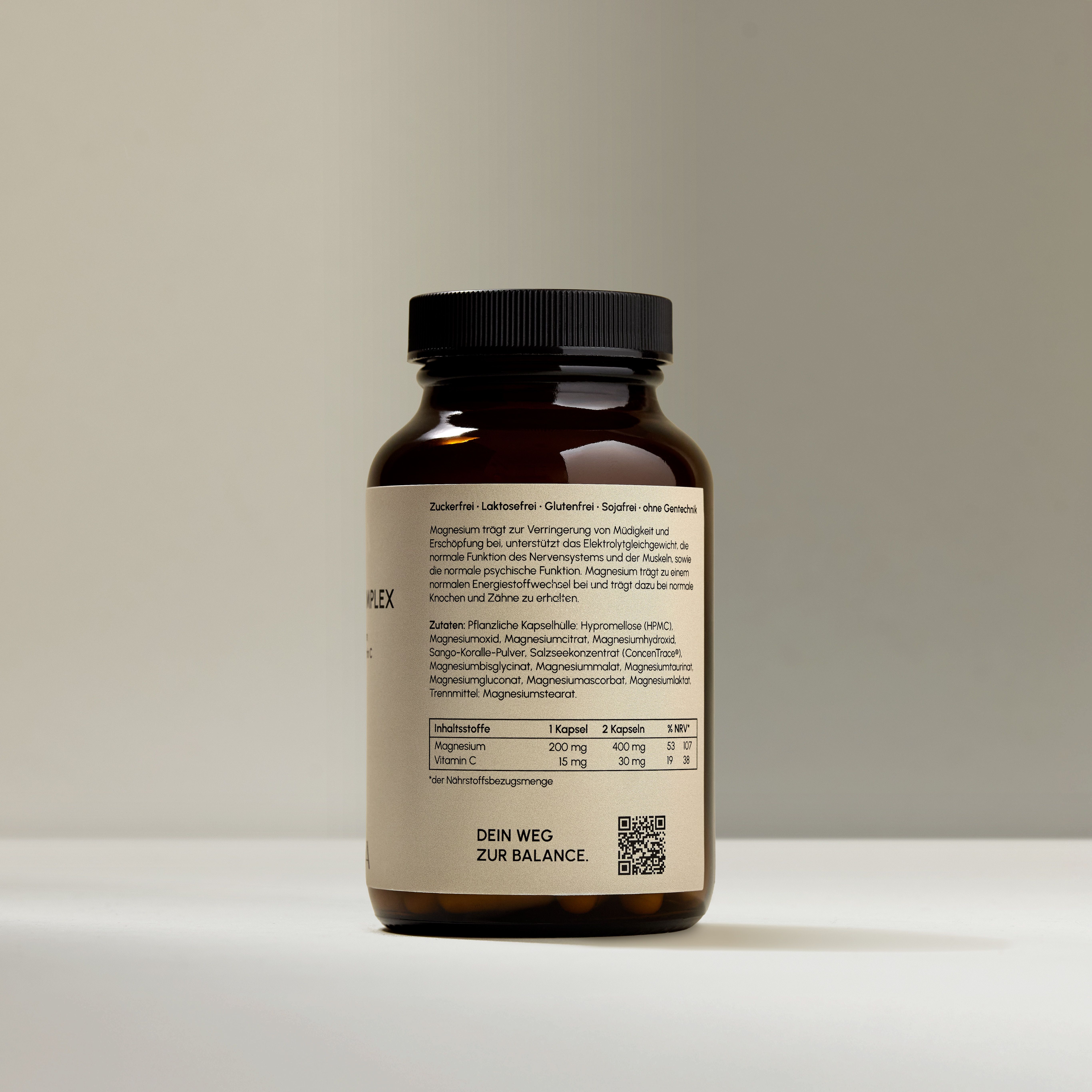 Seitenansicht der VIANOA Magnesium Komplex Flasche mit Informationen zu Inhaltsstoffen und Nährwertangaben auf dem Etikett.