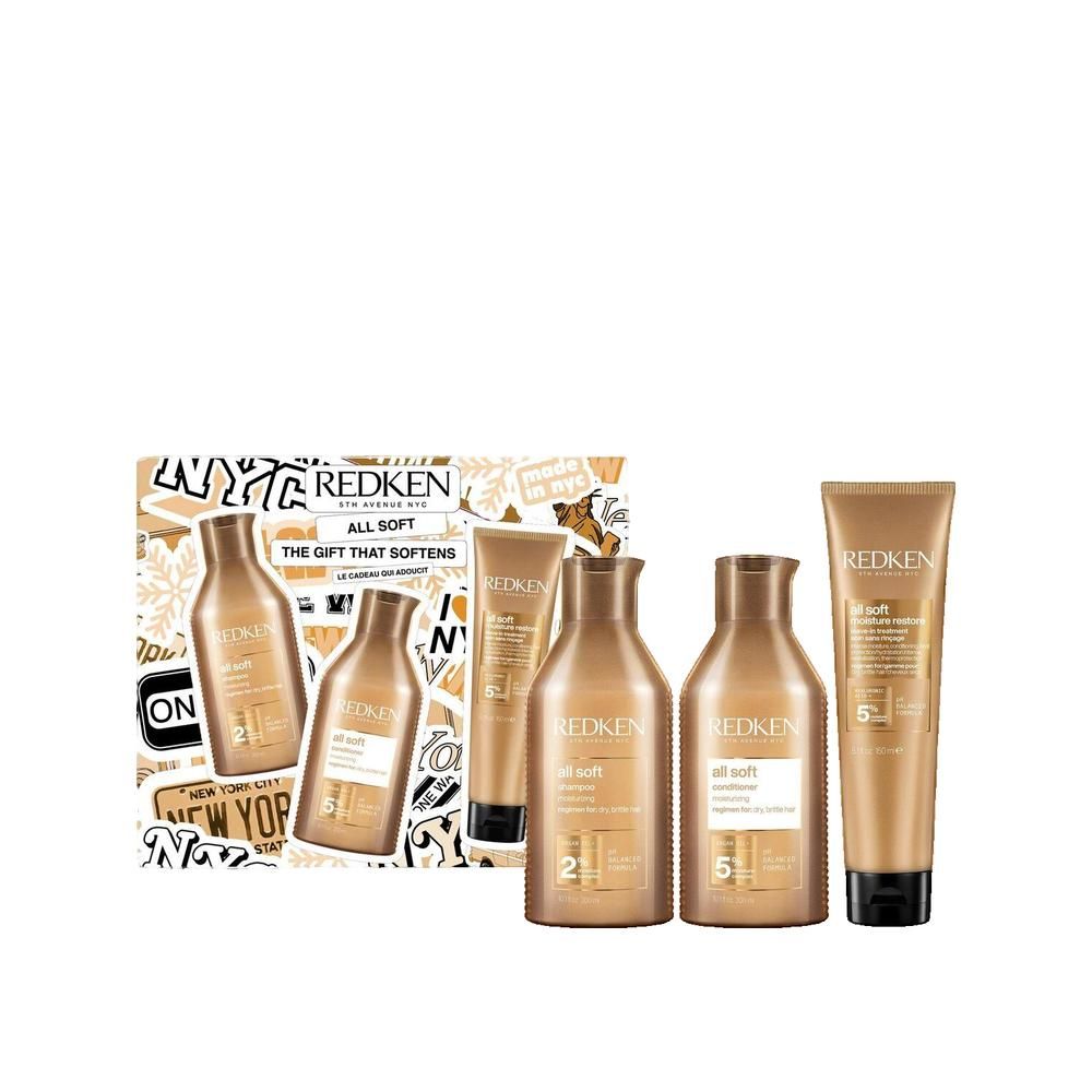 Geschenkset mit mehreren Redken-Haarpflegeprodukten. Flaschen und Tuben in Goldtönen.