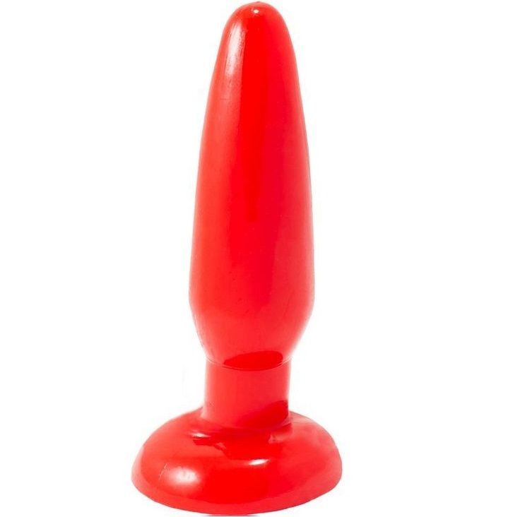 Roter Analplug, stehend. Konische Form mit breiter Basis.