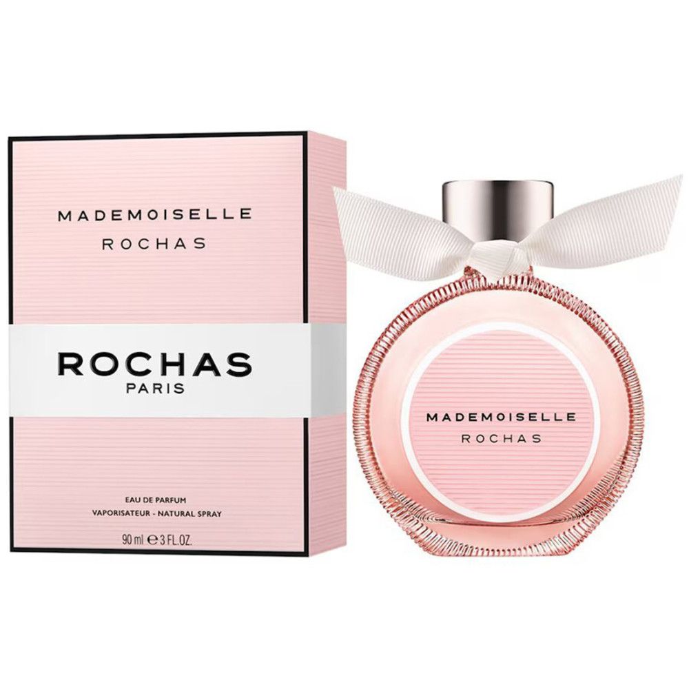 Rochas Mademoiselle Eau de Parfum mit Verpackung. Flakon und Schachtel rosa. Aufschrift: Mademoiselle Rochas, Rochas Paris.
