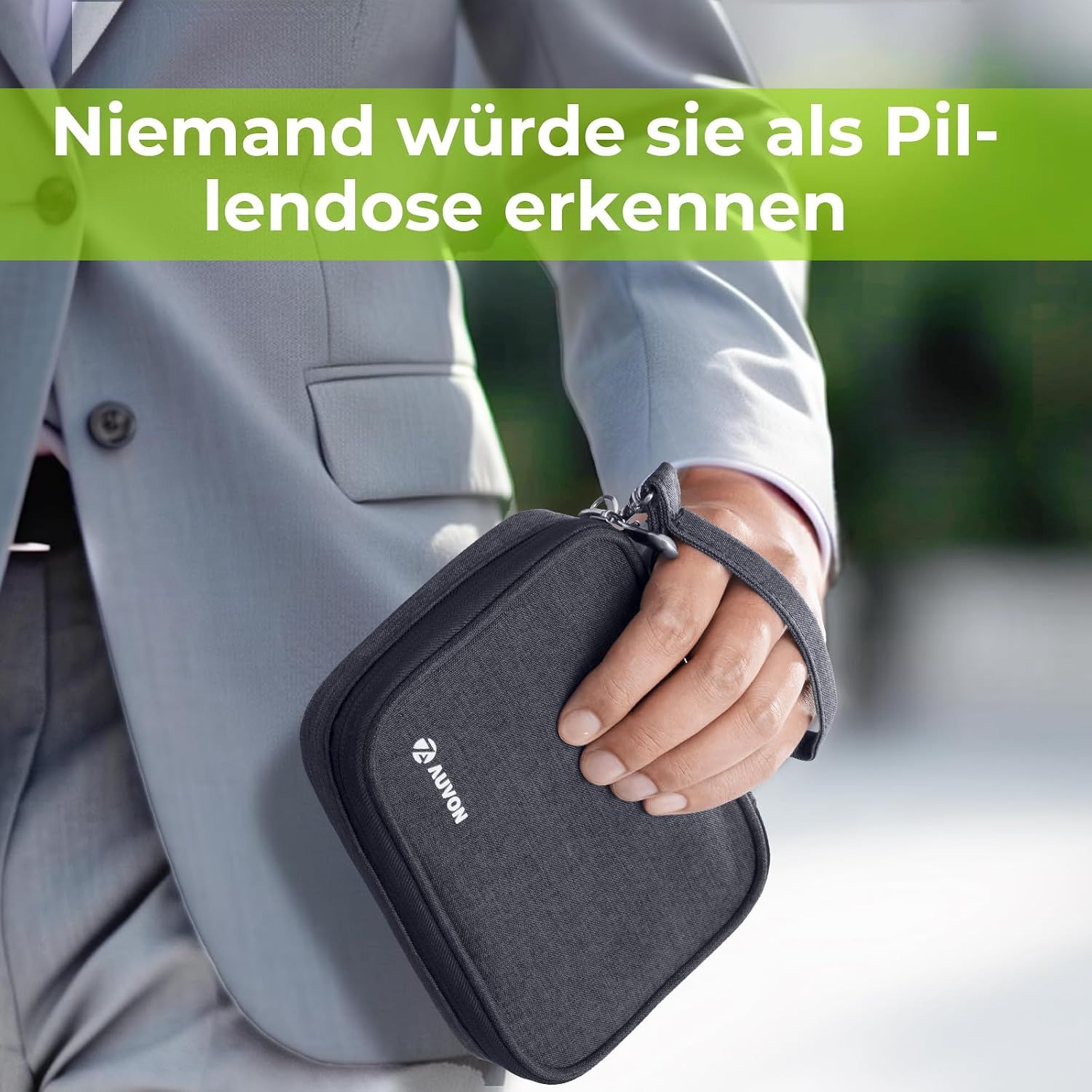Schwarze Pillendose mit drei Fächern, Symbolen für Morgen, Mittag und Abend.
