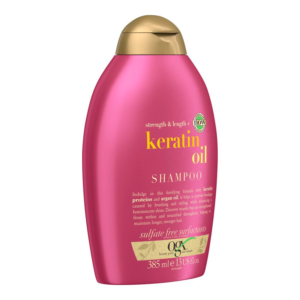 Rote Shampoo-Flasche mit goldfarbenem Deckel. Aufschrift: Keratin Oil, Shampoo, Stärke & Glanz. Enthält 385 ml.