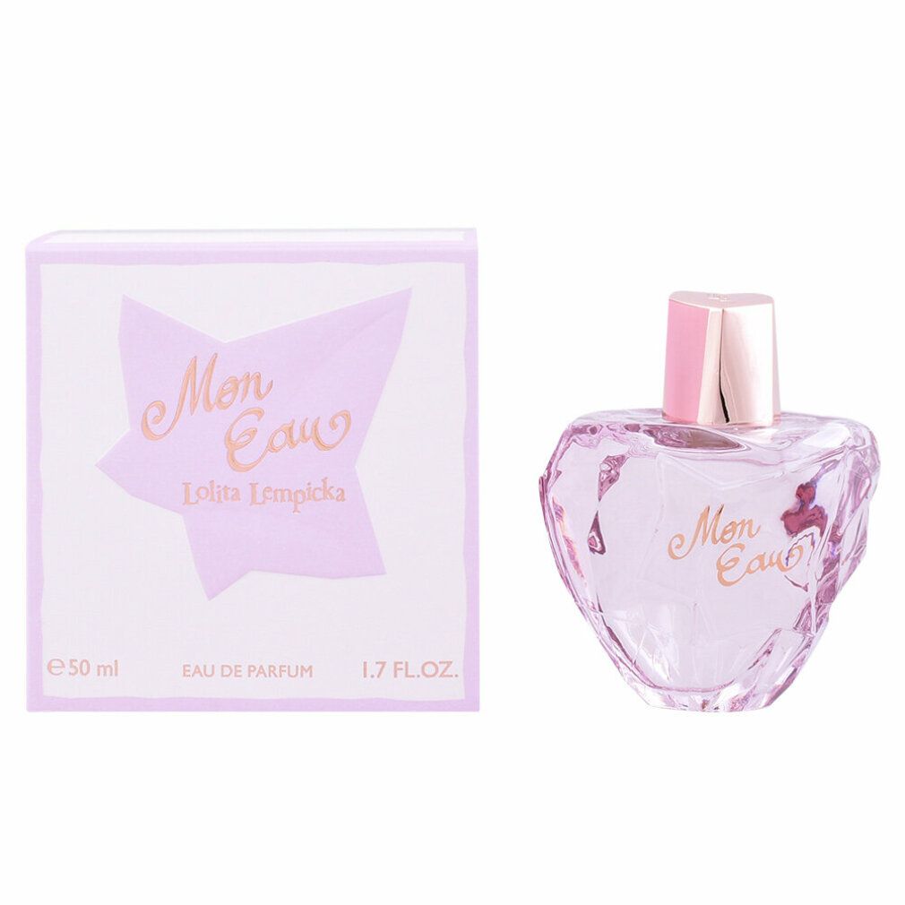 Parfümflakon und Schachtel. Flakon herzförmig, rosa. Aufschrift "Mon Eau" und "Lolita Lempicka". Schachtel rosa mit Stern.