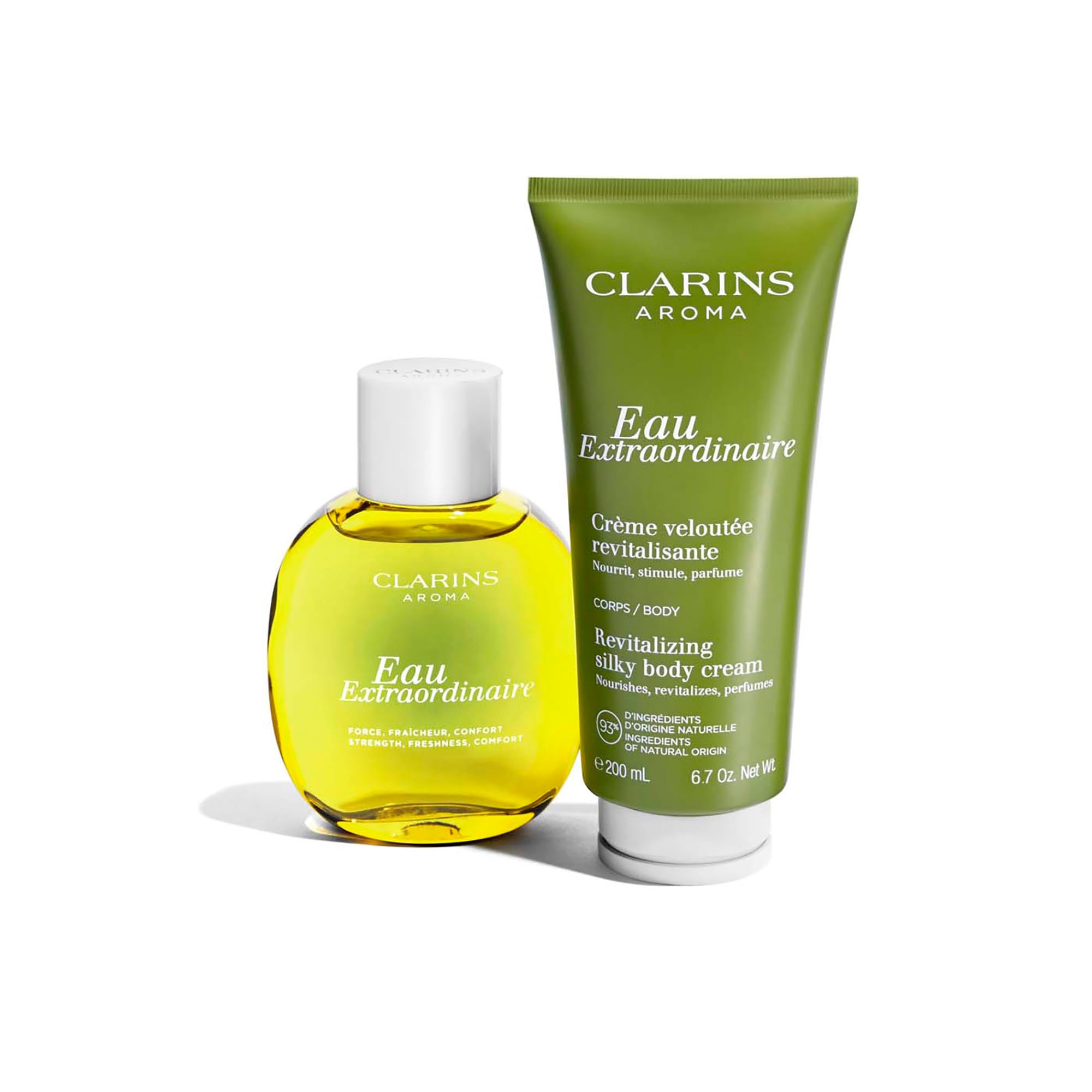 Set: Flasche und Tube. Flasche: Clarins Aroma Eau Extraordinaire. Tube: Crème veloutée revitalisante.