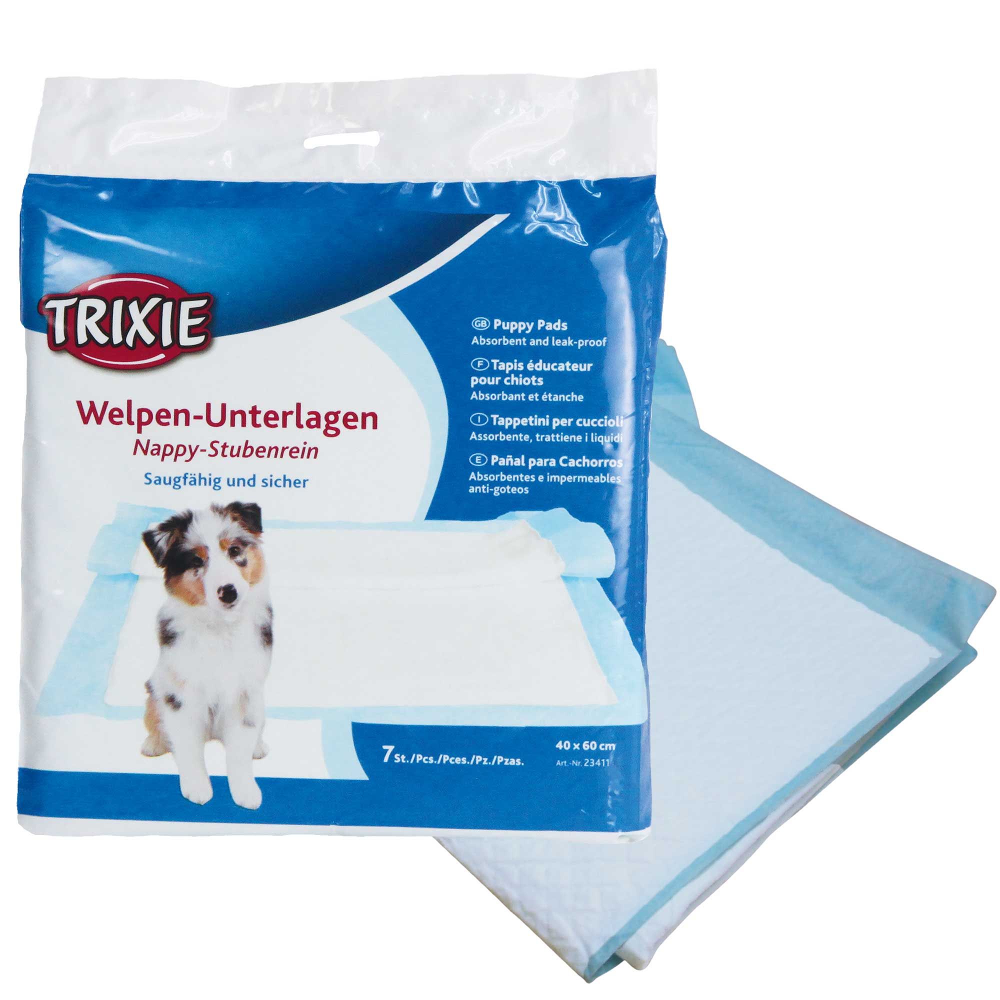 Verpackung mit Welpen-Unterlagen. Marke Trixie. 7 Stück. Saugfähig und sicher. Mit Welpen-Abbildung.