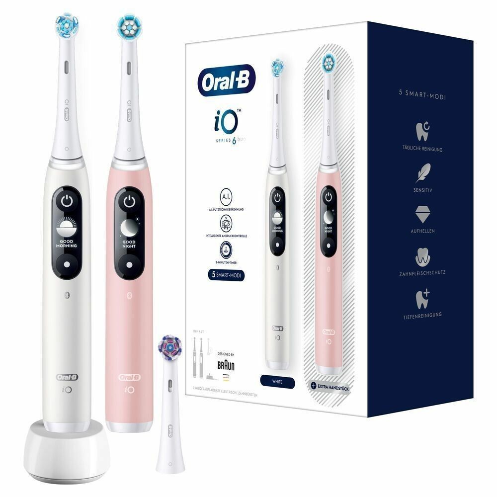 Elektrische Zahnbürsten Oral-B iO 6, weiß und rosa, mit Ladestation und Ersatzbürsten. Verpackung mit Produktabbildung und Logos.