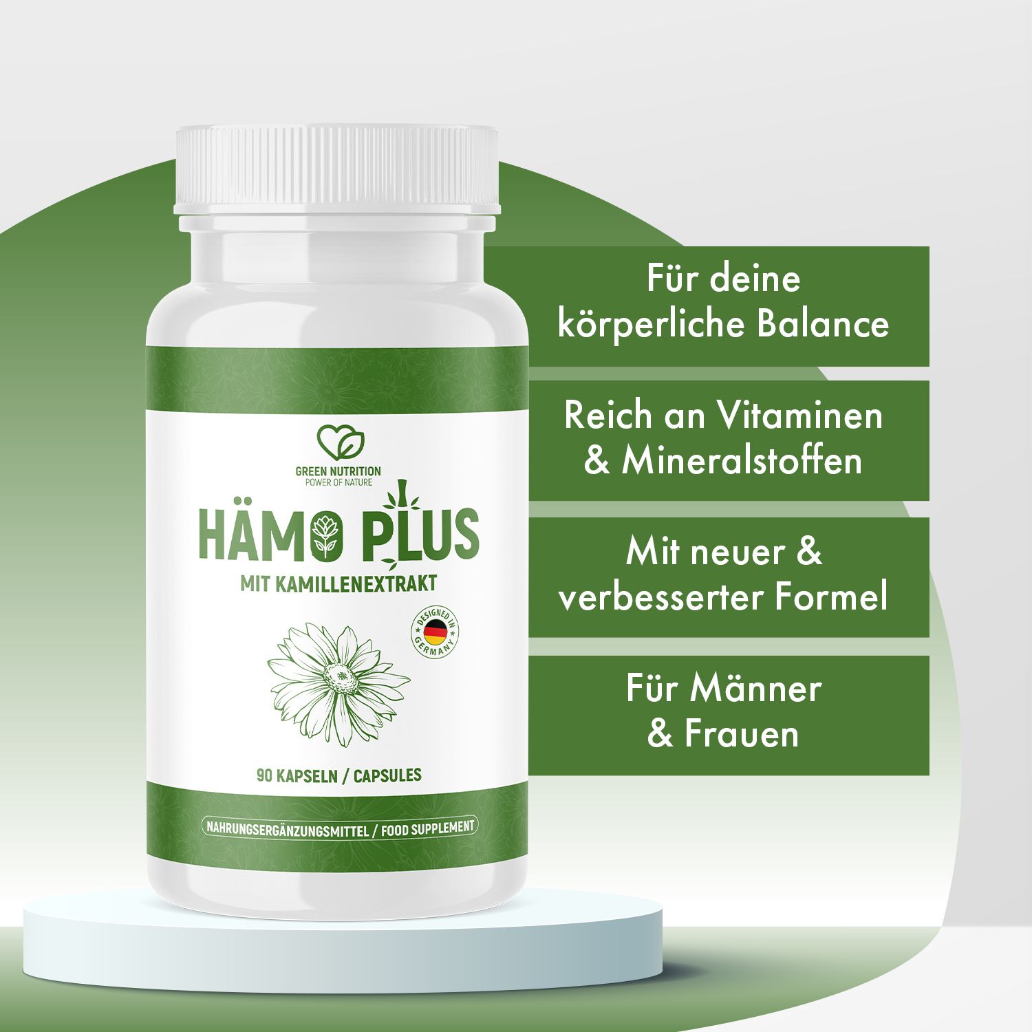 Weißes Pillenbehälter mit grünem Etikett. Aufschrift: Hämo Plus, Kamillenextrakt. 90 Kapseln. Auf Podest.