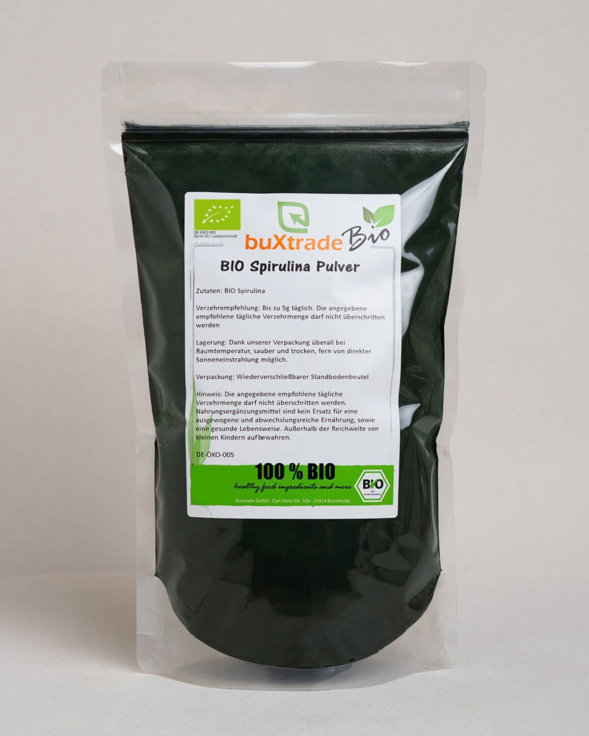 Verpackung mit buxtrade Bio Spirulina Pulver, 100% Bio-Siegel.