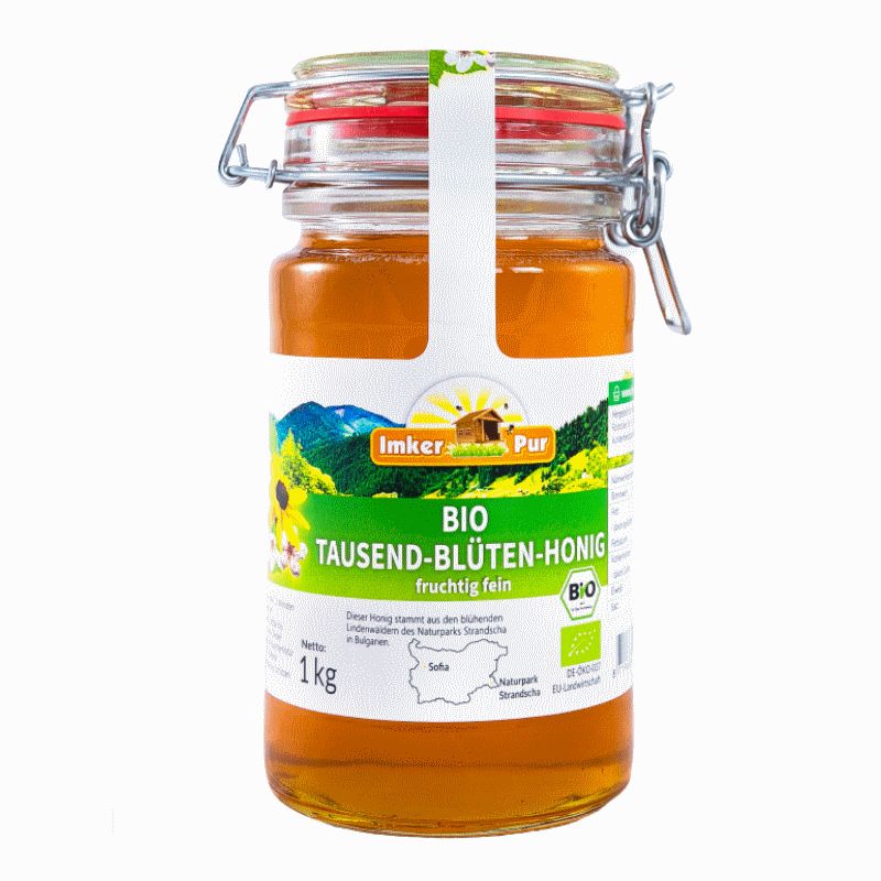 Glas Honig mit Etikett. Aufschrift: BIO Tausend-Blüten-Honig. Mit Bügelverschluss. 1 kg.