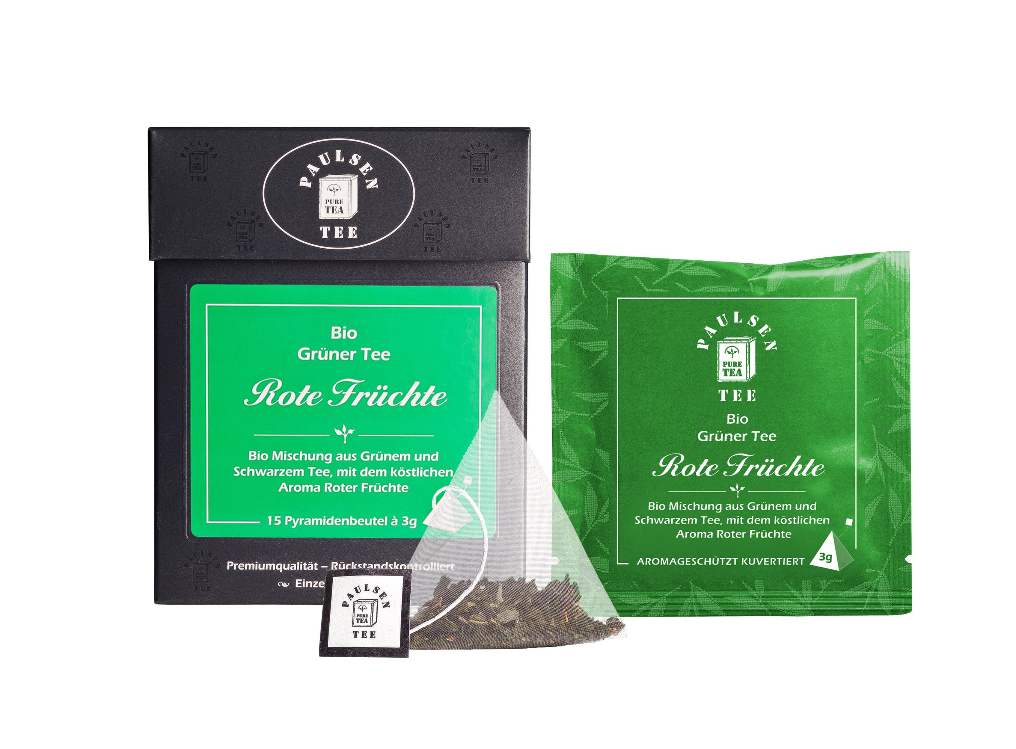 Grüner Tee mit Aroma Rote Früchte. Schwarze Schachtel mit grünem Etikett. Pyramidenbeutel sichtbar.