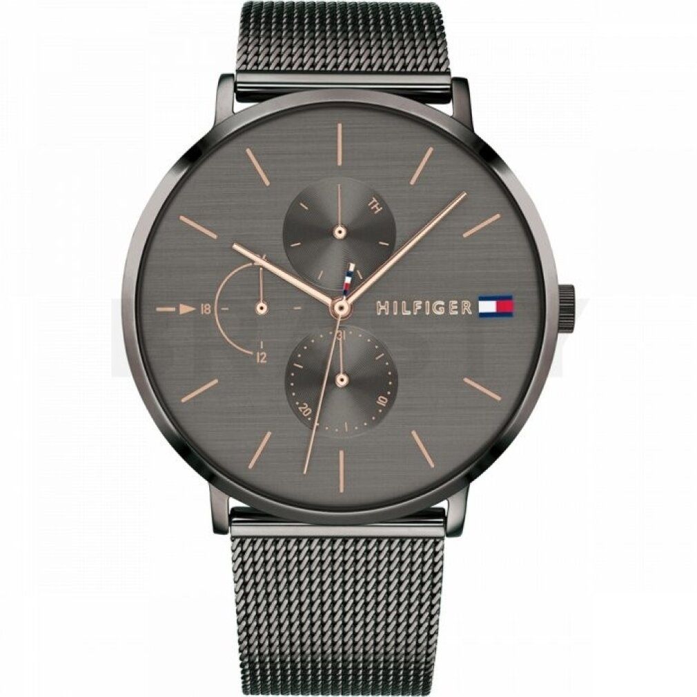 Graue Uhr mit roségoldenen Zeigern und Mesh-Armband. Hilfiger-Logo und drei kleine Zifferblätter.