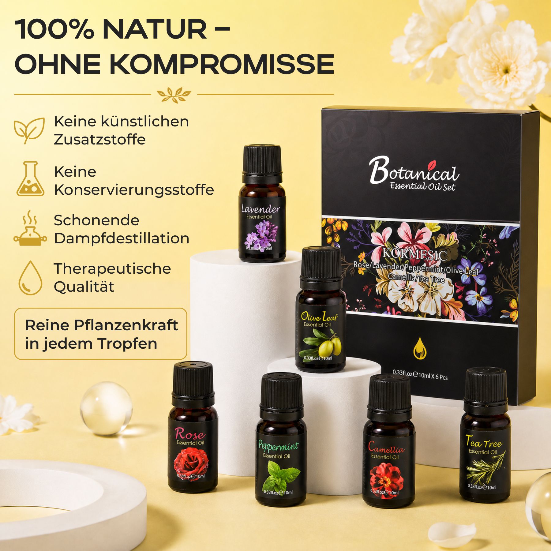 Set mit sechs kleinen Flaschen ätherischer Öle, darunter Lavendel, Olivenblatt, Rose, Pfefferminze, Zimt und Teebaum. Enthält eine schwarze Geschenkbox.