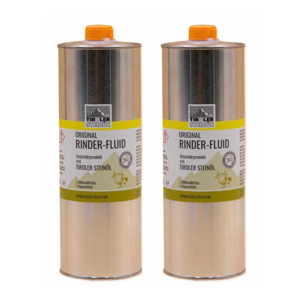 Zwei Metallkanister mit gelben Etiketten. Aufschrift: Original Rinder-Fluid mit Tiroler Steinöl. Veterinärprodukt.