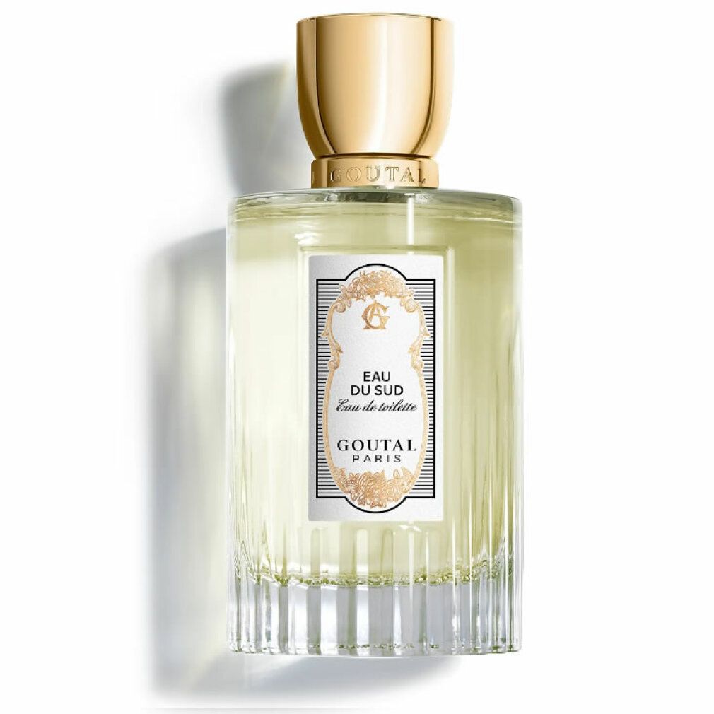 Goutal Paris Eau Du Sud Eau De Toilette Spray. Rechteckige Glasflasche mit goldenem Deckel. Weißes Etikett mit Text und Verzierungen.