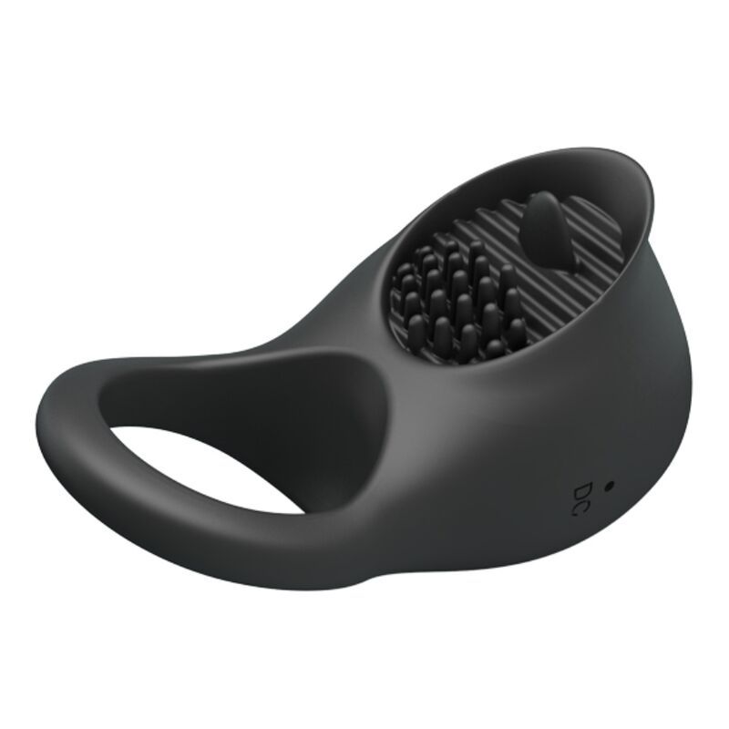 Schwarzer Penisring mit Zunge und Noppen. Mit Ring für die Basis. Aus Silikon.