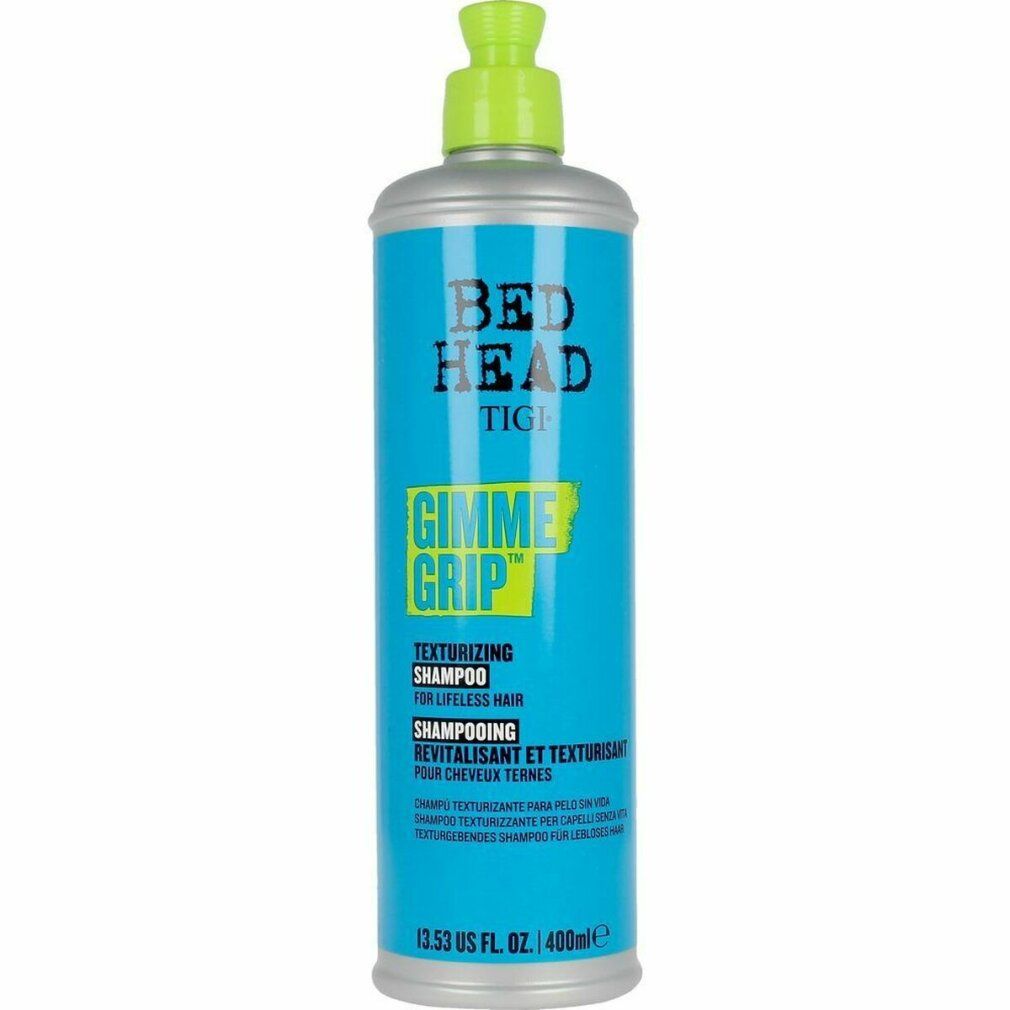 Türkis-farbene Shampoo-Flasche mit grünem Deckel. Aufschrift: Bed Head TIGI Gimme Grip Texturizing Shampoo.