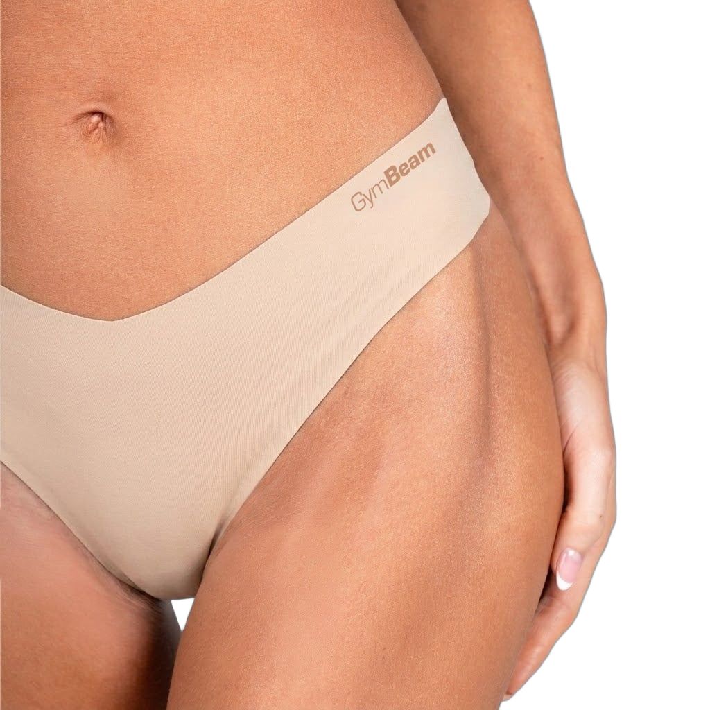 Beige nahtlose Damen-Tanga mit dezentem GymBeam-Logo am Bund.
