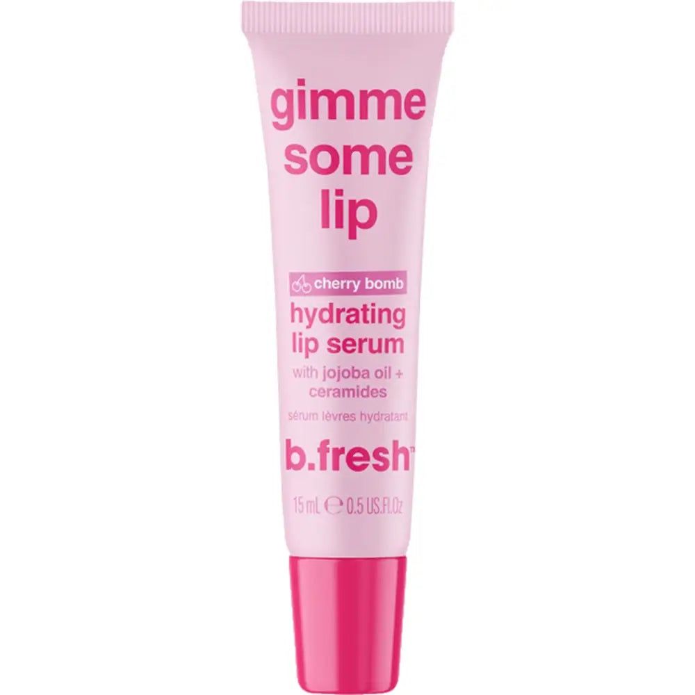 Rosa Tube mit rotem Deckel. Aufschrift: gimme some lip, Cherry bomb, hydrating lip serum, b.fresh, 15ml, 0.5 US fl oz.