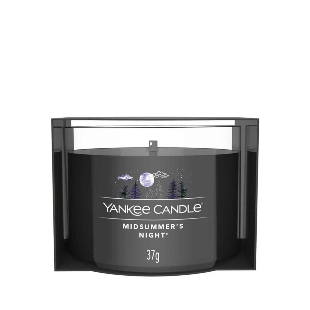 Kerze im Glasbehälter. Aufschrift: Yankee Candle, Midsummer's Night, 37g. Schwarzer Behälter mit Deckel.
