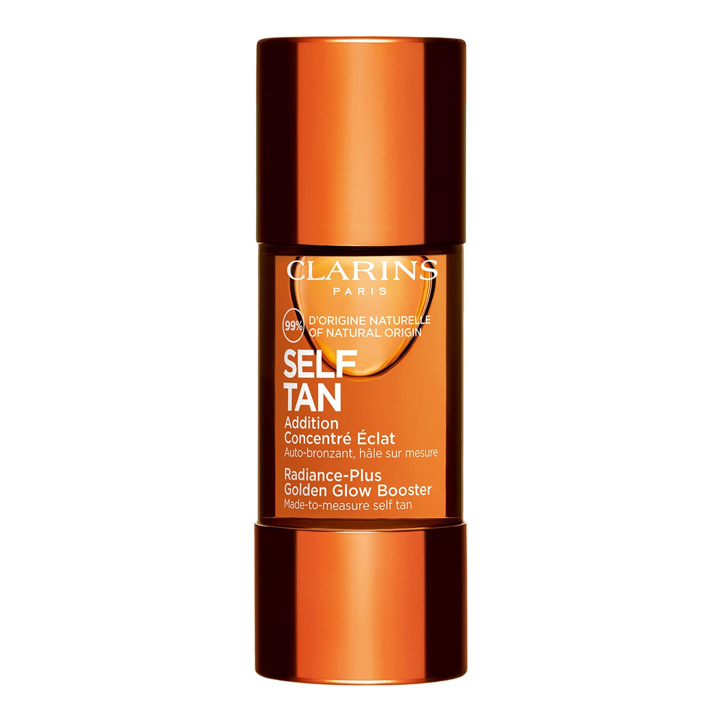 Clarins Radiance-Plus Golden Glow Booster. Braune Flasche mit goldener Kappe. Text: Selbstbräuner, 99% natürlichen Ursprungs.