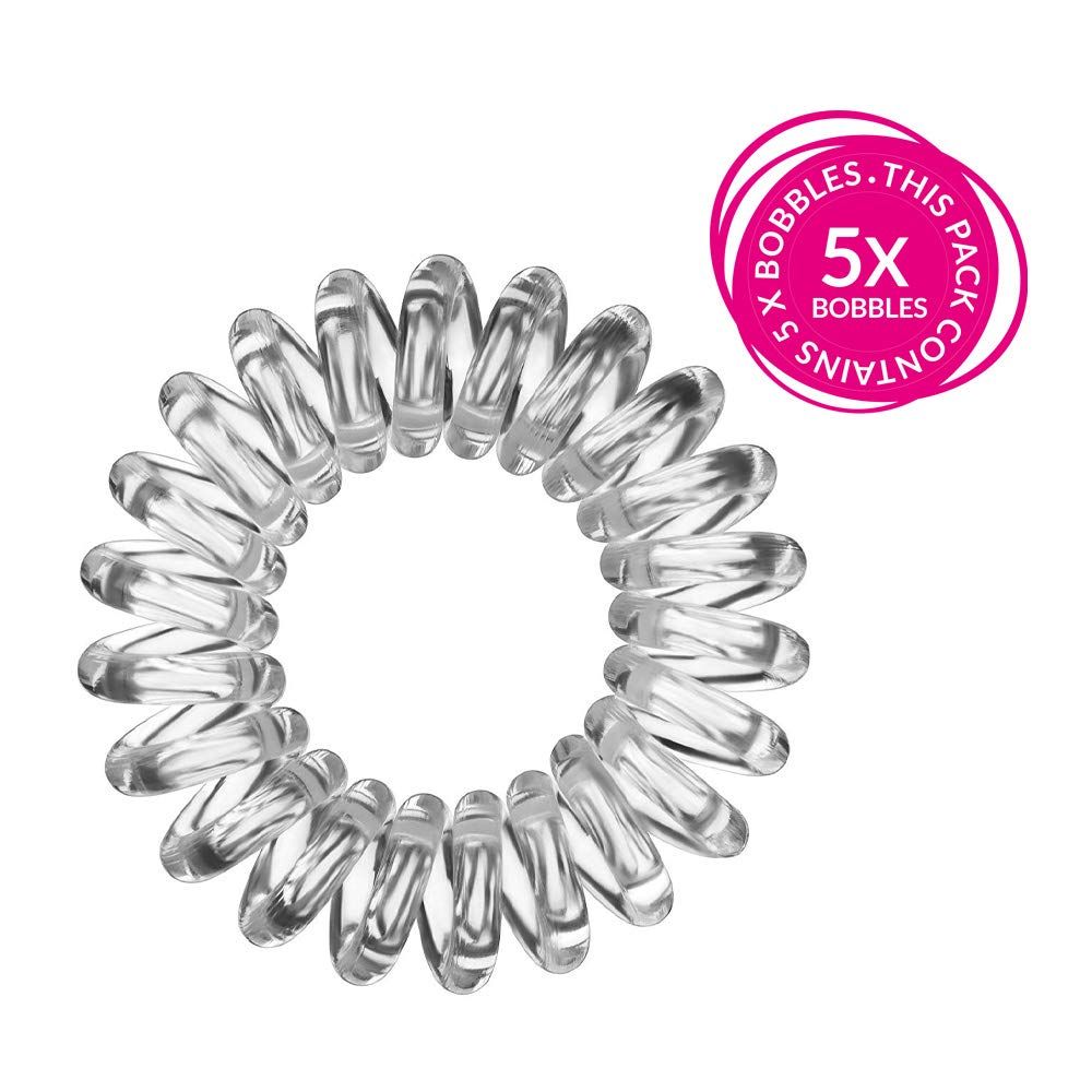 Haargummi in Spiralform, transparent. Mit pinkfarbener Verpackung, Text: 5x Bobbles.