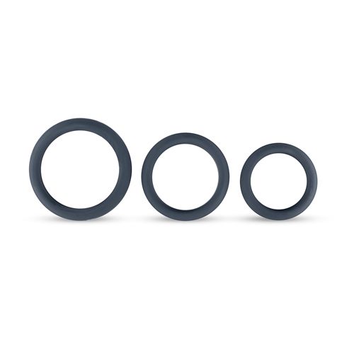 Drei graue Penisringe aus Silikon in verschiedenen Größen. Ringe sind rund.