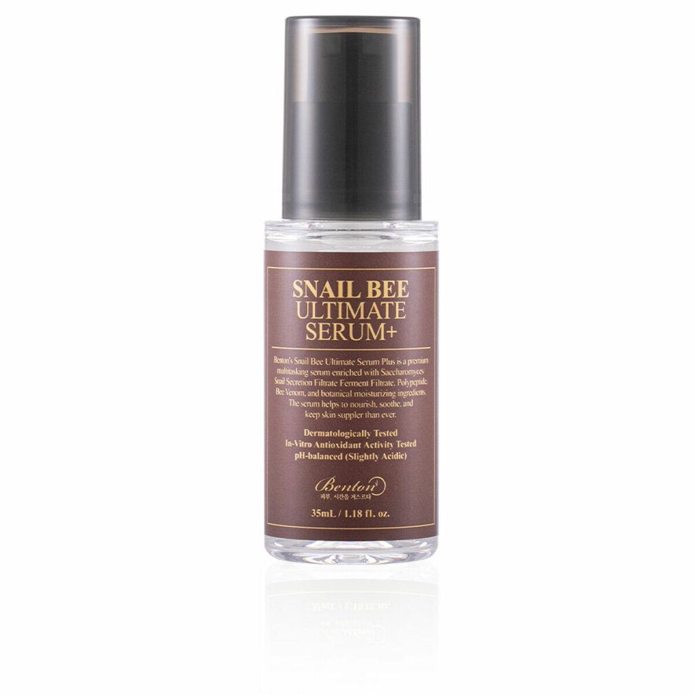 Serumflasche mit braunem Etikett. Aufschrift: Snail Bee Ultimate Serum+. Schwarzer Deckel. Klarer Behälter.