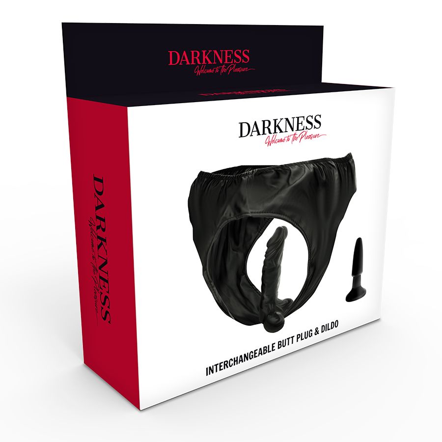 Verpackung von Darkness. Schwarzer Karton mit Produktbild. Enthält Strap-On Höschen und Analplug. Text: Interchangeable Butt Plug & Dildo.