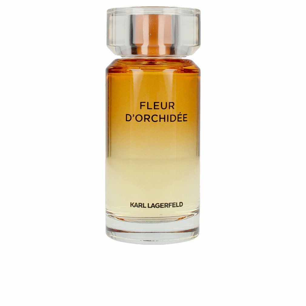 Fleur d'Orchidée Eau de Parfum Spray Flakon. Aufschrift: Karl Lagerfeld, Fleur d'Orchidée. Transparenter Flakon mit silbernem Verschluss.