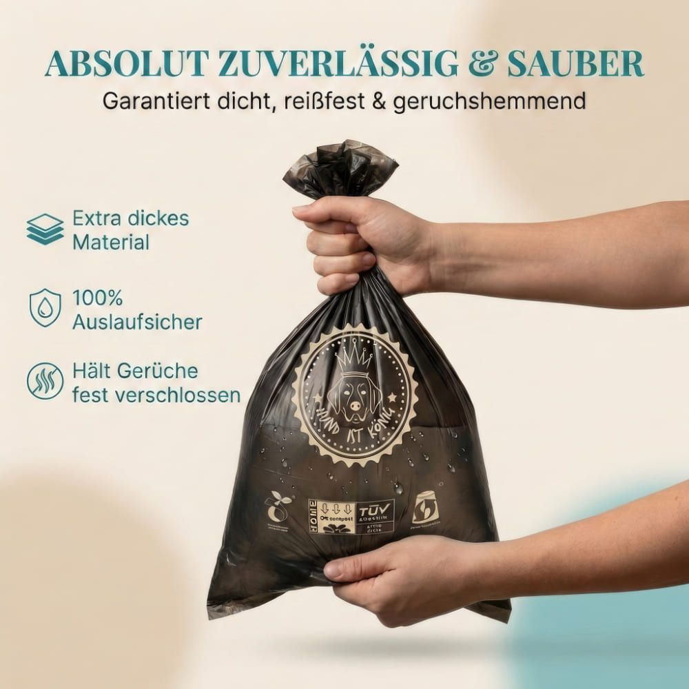 Schwarzer Kotbeutel, gefüllt, in Hand gehalten. Logo und Zertifizierungen. Text: Extra dickes Material.