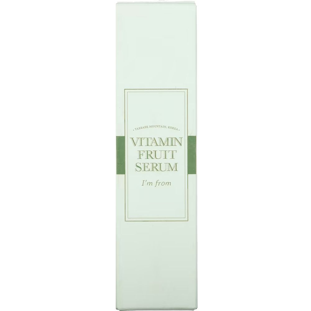 Hohe, rechteckige Verpackung. Aufschrift: Vitamin Fruit Serum, I'm from. Grün-weiße Farbgebung.