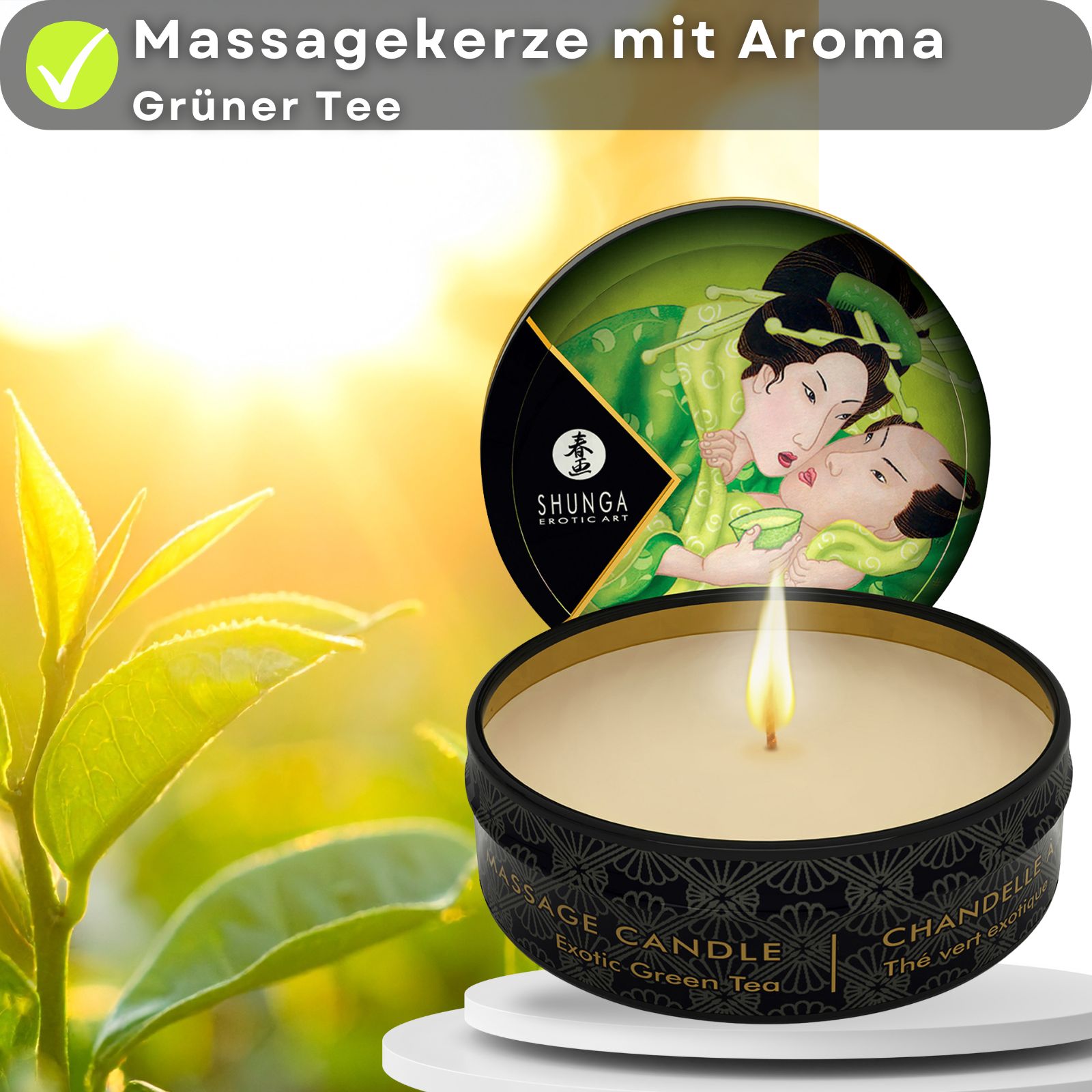 Massagekerze mit Aroma Grüner Tee. Runde, schwarze Kerze mit Deckel. Aufschrift: Massage Candle, Exotic Green Tea. Deckel mit Illustration.