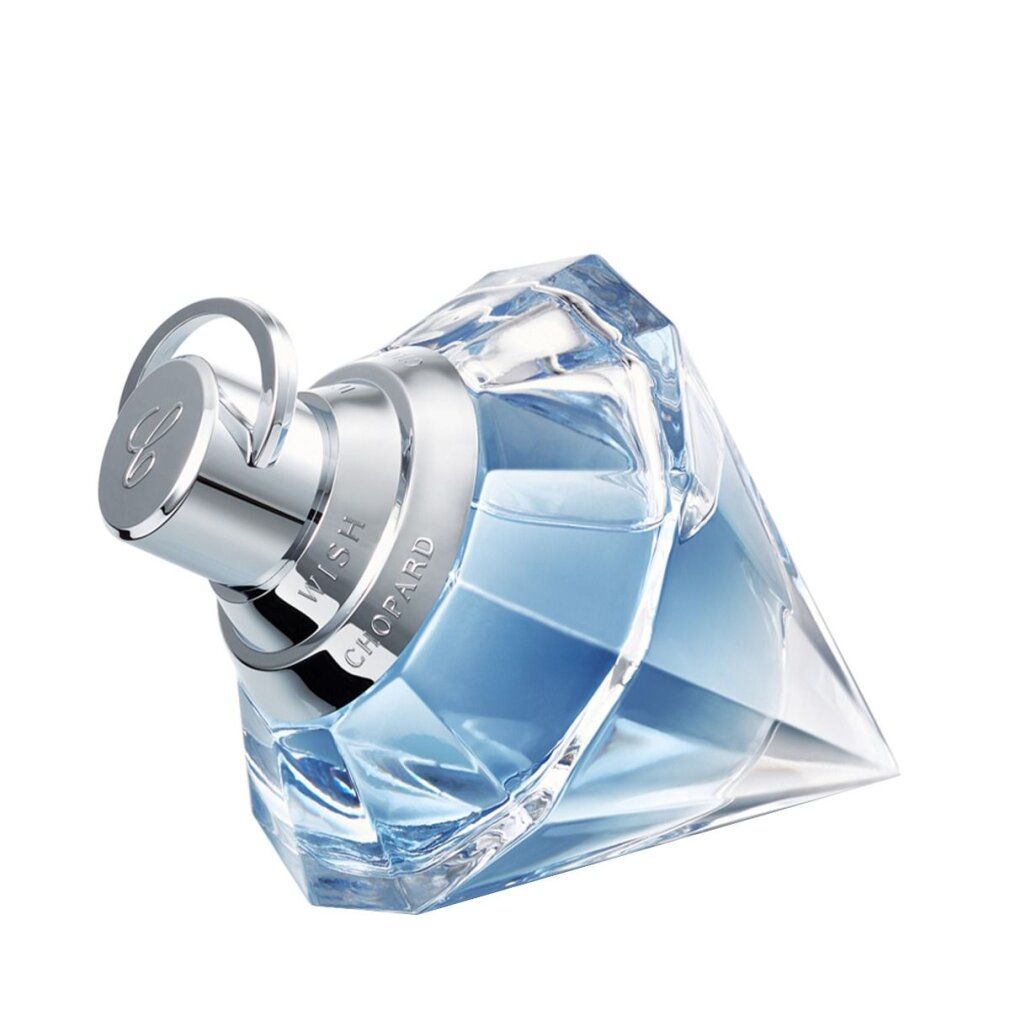 Diamantförmige Glasflasche mit hellblauem Parfüm, geneigt, mit silbernem Verschluss.