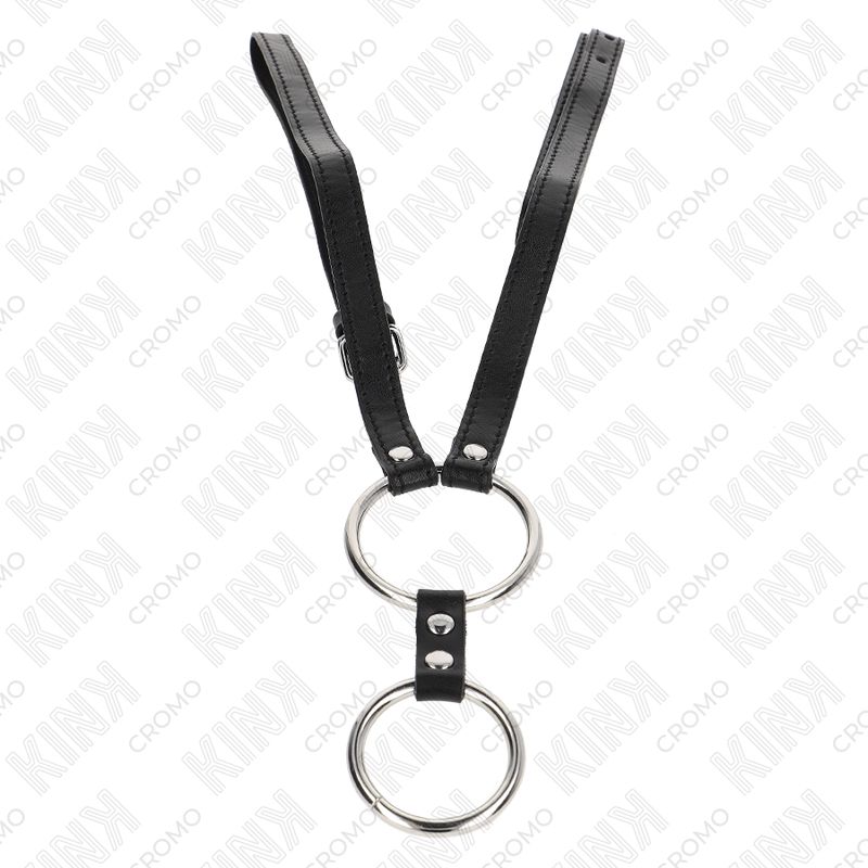 Doppelter Penisring aus Metall mit Ledergurten. Zwei Metallringe, verbunden mit Lederriemen und Schnalle.