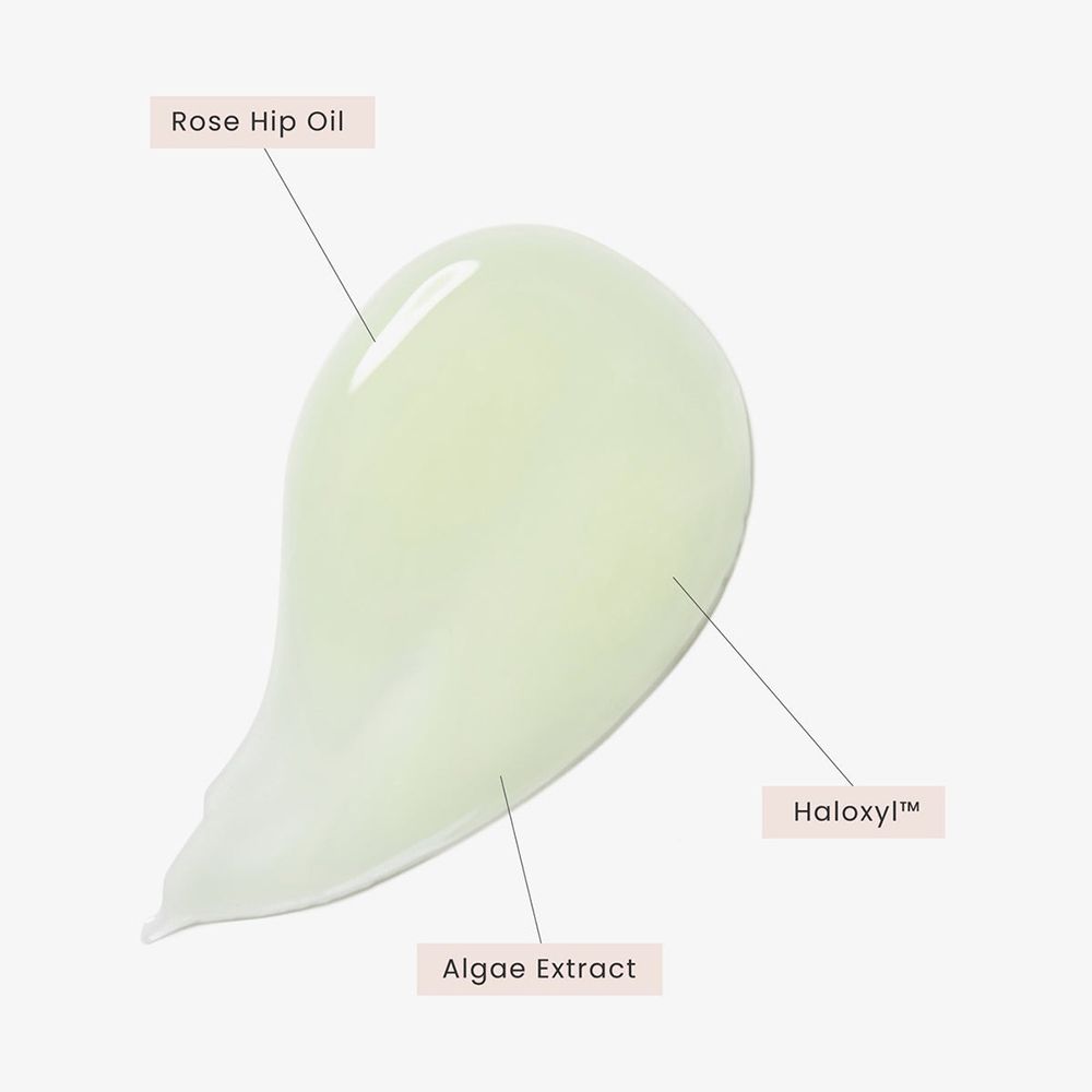 Gel-Tropfen mit Beschriftungen: Rose Hip Oil, Haloxyl, Algae Extract.