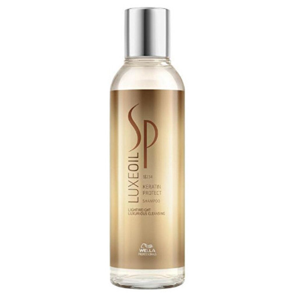 Shampoo-Flasche mit silbernem Deckel. Aufschrift: SP Luxe Oil Keratin Protect.