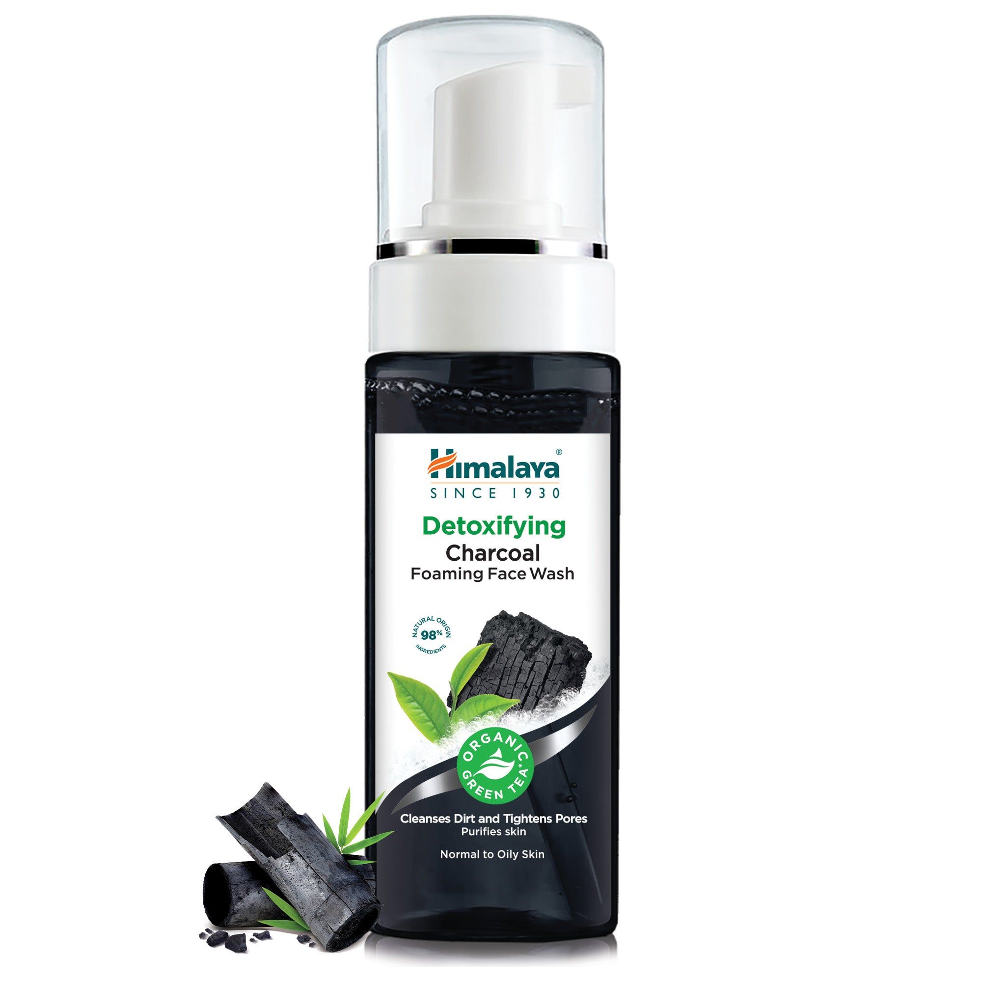 Flasche Himalaya Entgiftende Schäumende Gesichtswäsche mit Holzkohle, mit Holzkohle-Stücken.