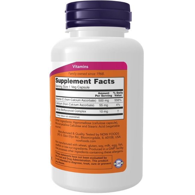 Weiße Flasche mit lila Deckel. Etikett mit orangefarbenem Hintergrund und Text: Vitamin C, Calcium Ascorbat, 100 Veg-Kapseln.