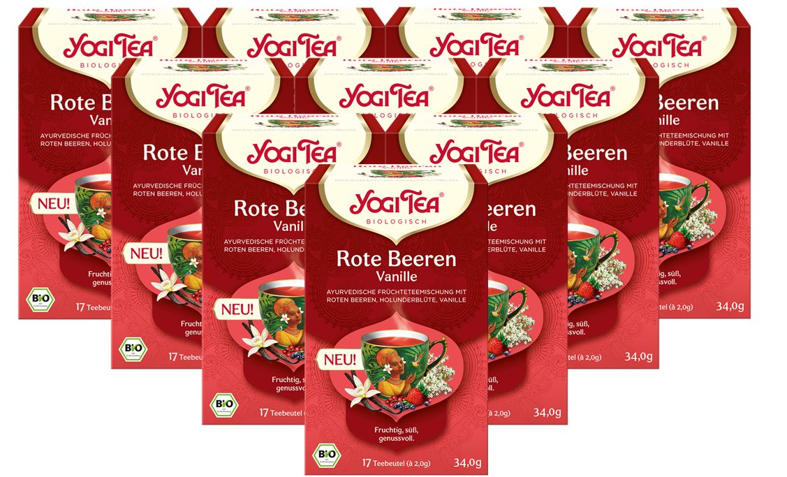 Mehrere Packungen Tee. Rote Verpackung mit Produktnamen und Logo. "Rote Beeren Vanille" und "Yogi Tea" sind lesbar.