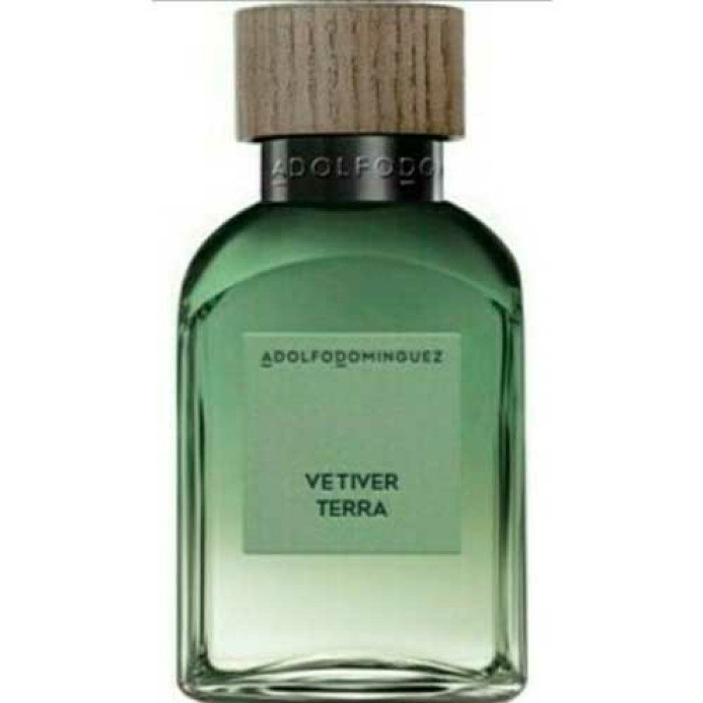 Grüne Glasflasche mit Holzdeckel. Aufschrift: VETIVER TERRA. Marke: ADOLFODOMINGUEZ.