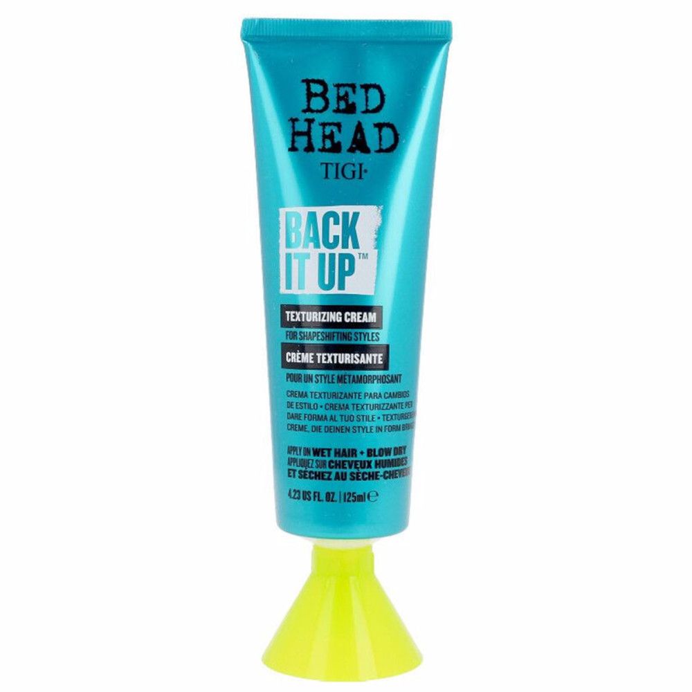 Türkis Tube mit schwarzem Text. "BED HEAD TIGI BACK IT UP Texturizing Cream". 125ml. Grüner Verschluss.